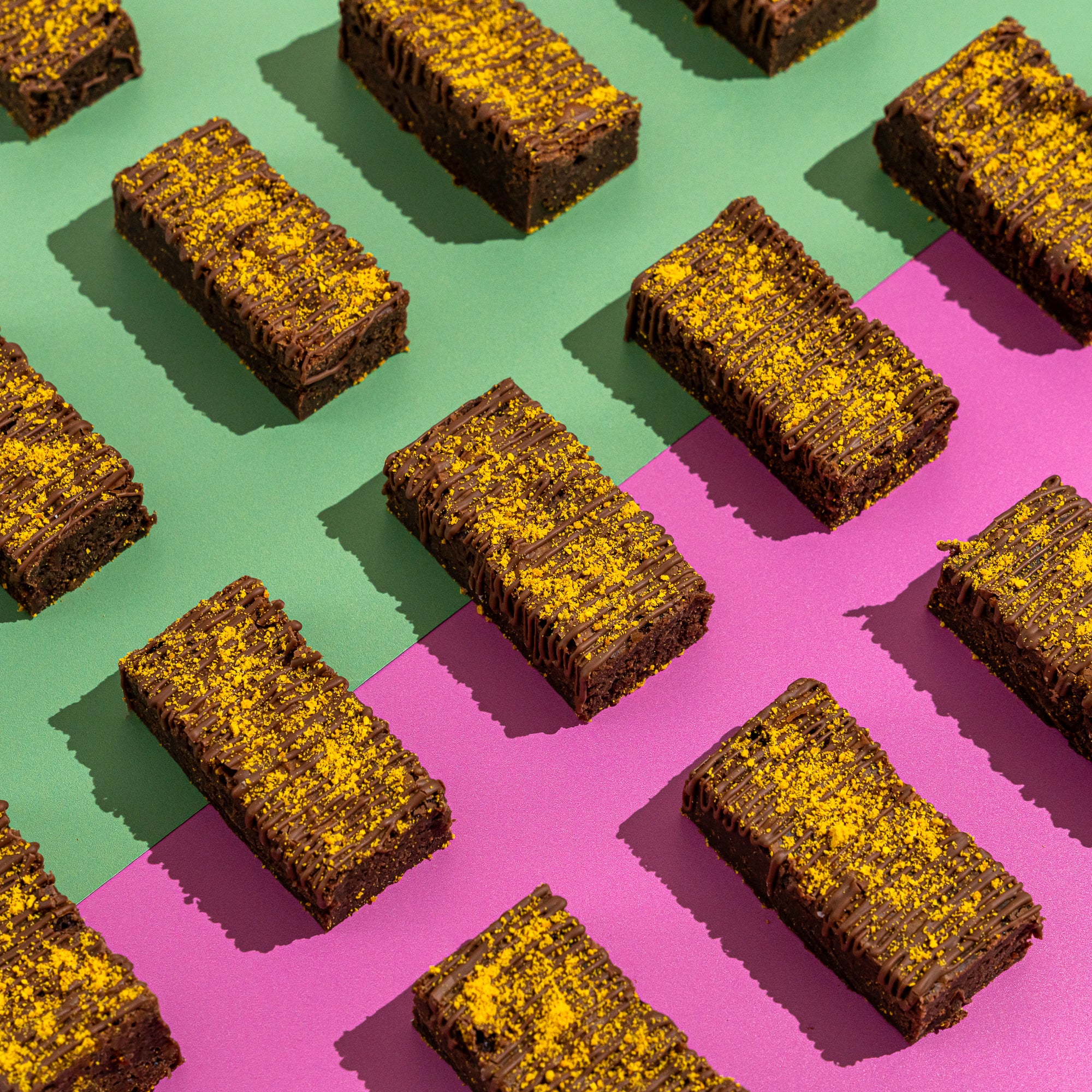 Chocolate orange brownie on a background of green and lilac